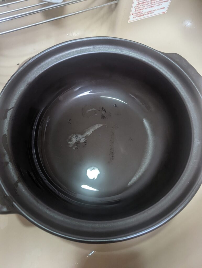 A slightly burnt pot
