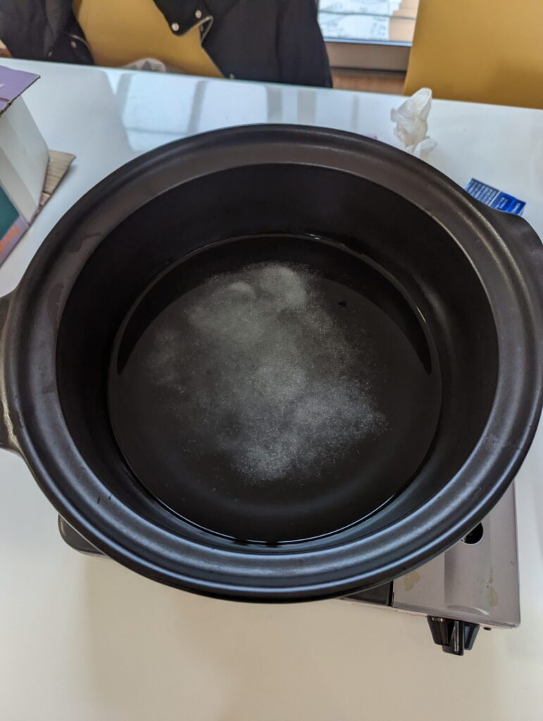 Citric acid in a slightly burnt pot